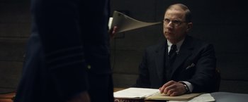 Movie still from “Allied” (2016), directed by Robert Zemeckis – Medium shot, Over the shoulder angle