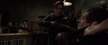 Movie still from “Allied” (2016), directed by Robert Zemeckis – Medium shot, Over the shoulder angle