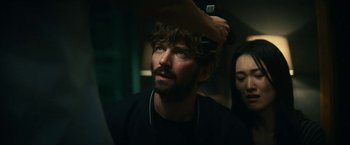 Movie still from “Kate” (2021), directed by Cedric Nicolas-Troyan – Close Up shot, Over the shoulder angle