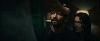 Movie still from “Kate” (2021), directed by Cedric Nicolas-Troyan – Close Up shot, Over the shoulder angle