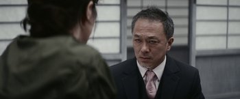 Movie still from “Kate” (2021), directed by Cedric Nicolas-Troyan – Close Up shot, Over the shoulder angle