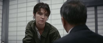 Movie still from “Kate” (2021), directed by Cedric Nicolas-Troyan – Close Up shot, Over the shoulder angle