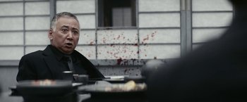 Movie still from “Kate” (2021), directed by Cedric Nicolas-Troyan – Close Up shot, Over the shoulder angle