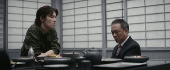 Movie still from “Kate” (2021), directed by Cedric Nicolas-Troyan – Medium shot, Over the shoulder angle