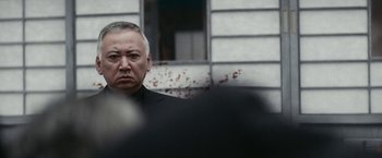 Movie still from “Kate” (2021), directed by Cedric Nicolas-Troyan – Close Up shot, Over the shoulder angle