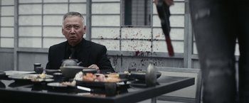 Movie still from “Kate” (2021), directed by Cedric Nicolas-Troyan – Medium shot, Over the shoulder angle