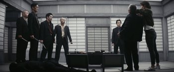 Movie still from “Kate” (2021), directed by Cedric Nicolas-Troyan – Wide shot, Low angle