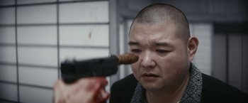 Movie still from “Kate” (2021), directed by Cedric Nicolas-Troyan – Close Up shot, Over the shoulder angle