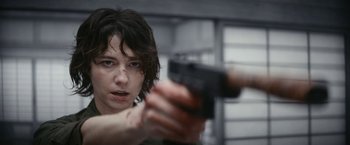 Movie still from “Kate” (2021), directed by Cedric Nicolas-Troyan – Close Up shot, Over the shoulder angle