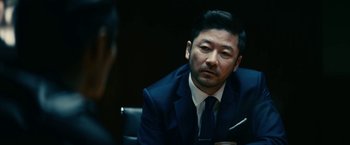 Movie still from “Kate” (2021), directed by Cedric Nicolas-Troyan – Close Up shot, Over the shoulder angle