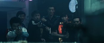 Movie still from “Kate” (2021), directed by Cedric Nicolas-Troyan – Medium shot, Low angle