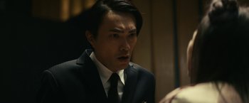 Movie still from “Kate” (2021), directed by Cedric Nicolas-Troyan – Close Up shot, Over the shoulder angle