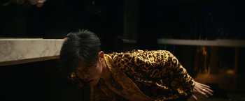 Movie still from “Kate” (2021), directed by Cedric Nicolas-Troyan – Medium shot, Low angle