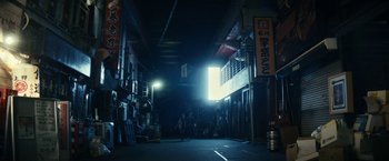 Movie still from “Kate” (2021), directed by Cedric Nicolas-Troyan – Extreme Wide shot, Low angle