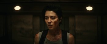 Movie still from “Kate” (2021), directed by Cedric Nicolas-Troyan – Close Up shot, Over the shoulder angle