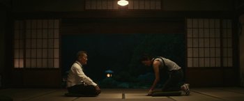 Movie still from “Kate” (2021), directed by Cedric Nicolas-Troyan – Medium shot, Low angle