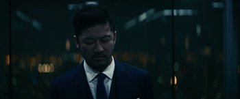 Movie still from “Kate” (2021), directed by Cedric Nicolas-Troyan – Close Up shot, Over the shoulder angle