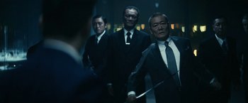 Movie still from “Kate” (2021), directed by Cedric Nicolas-Troyan – Medium shot, Low angle