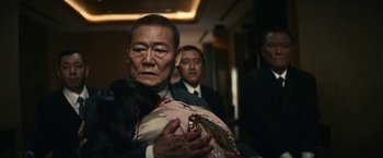 Movie still from “Kate” (2021), directed by Cedric Nicolas-Troyan – Close Up shot, Over the shoulder angle