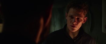 Movie still from “Kidnapping Stella” (2019), directed by Thomas Sieben – A man looking at his reflection in a mirror; Close Up shot, Over the shoulder angle