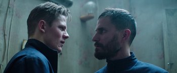 Movie still from “Kidnapping Stella” (2019), directed by Thomas Sieben – Two men face each other in a bathroom; Close Up shot, Low angle