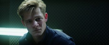 Movie still from “Kidnapping Stella” (2019), directed by Thomas Sieben – A person wearing a blue shirt; Close Up shot, Low angle