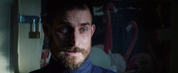 Movie still from “Kidnapping Stella” (2019), directed by Thomas Sieben – A person with a beard; Close Up shot, Over the shoulder angle