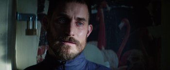 Movie still from “Kidnapping Stella” (2019), directed by Thomas Sieben – A person with a beard; Close Up shot, Low angle