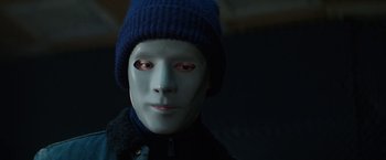 Movie still from “Kidnapping Stella” (2019), directed by Thomas Sieben – A man wearing a mask and a blue hat; Close Up shot, Low angle