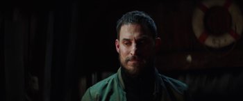 Movie still from “Kidnapping Stella” (2019), directed by Thomas Sieben – A person wearing a jacket; Close Up shot, Over the shoulder angle