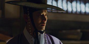 Movie still from “Kingdom” (2019), created by Eun-hee Kim – Close Up shot, Low angle