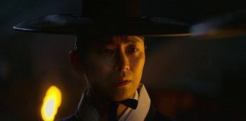 Movie still from “Kingdom” (2019), created by Eun-hee Kim – Close Up shot, Low angle