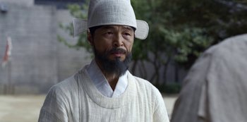 Movie still from “Kingdom” (2019), created by Eun-hee Kim – Close Up shot, Over the shoulder angle