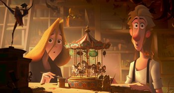 Movie still from “Klaus” (2019), directed by Carlos Martínez López – A woman and a man sitting at a table with a merry go round; Wide shot, High angle