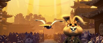 Movie still from “Kung Fu Panda 3” (2016), directed by Jennifer Yuh Nelson – An image of an animated rabbit in the middle of a crowd; Wide shot, Low angle
