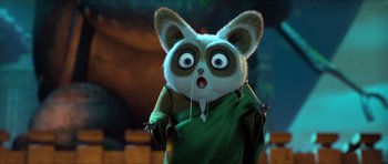 Movie still from “Kung Fu Panda 3” (2016), directed by Jennifer Yuh Nelson – A stuffed animal is wearing a green shirt; Close Up shot, Low angle