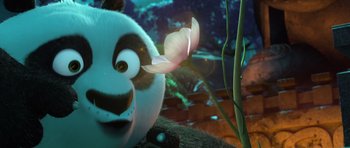 Movie still from “Kung Fu Panda 3” (2016), directed by Jennifer Yuh Nelson – A panda bear with a flower in front of it; Close Up shot, Low angle