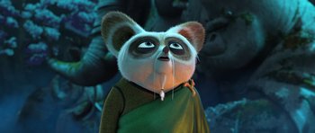 Movie still from “Kung Fu Panda 3” (2016), directed by Jennifer Yuh Nelson – A cartoon character is wearing a green shirt; Close Up shot, Low angle