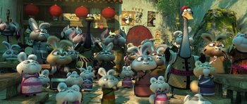 Movie still from “Kung Fu Panda 3” (2016), directed by Jennifer Yuh Nelson – A bunch of cartoon characters are in a courtyard; Wide shot, Low angle