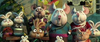 Movie still from “Kung Fu Panda 3” (2016), directed by Jennifer Yuh Nelson – A group of cartoon characters are standing in a room; Medium shot, Low angle