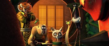 Movie still from “Kung Fu Panda 3” (2016), directed by Jennifer Yuh Nelson – A group of cartoon characters in front of an open door; Medium shot, Low angle