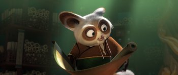 Movie still from “Kung Fu Panda 3” (2016), directed by Jennifer Yuh Nelson – A stuffed animal is sitting in a book; Close Up shot, High angle