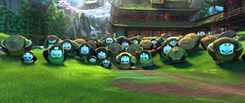 Movie still from “Kung Fu Panda 3” (2016), directed by Jennifer Yuh Nelson – A group of people in a field with a building in the background; Extreme Wide shot, High angle