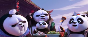Movie still from “Kung Fu Panda 3” (2016), directed by Jennifer Yuh Nelson – A couple of panda bears standing next to each other; Medium shot, Low angle