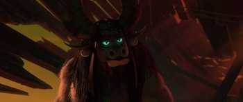 Movie still from “Kung Fu Panda 3” (2016), directed by Jennifer Yuh Nelson – The head of an animal wearing a horned headdress; Close Up shot, Low angle