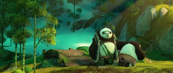 Movie still from “Kung Fu Panda 3” (2016), directed by Jennifer Yuh Nelson – A panda bear sitting on top of a swing in the woods; Wide shot, Low angle