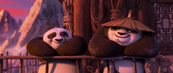 Movie still from “Kung Fu Panda 3” (2016), directed by Jennifer Yuh Nelson – A couple of stuffed animals sitting next to each other; Medium shot, Low angle