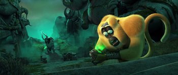 Movie still from “Kung Fu Panda 3” (2016), directed by Jennifer Yuh Nelson – A scene from the animated movie where a bear is in the middle of a cave; Medium shot, Low angle