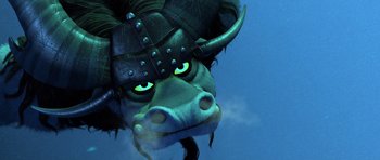 Movie still from “Kung Fu Panda 3” (2016), directed by Jennifer Yuh Nelson – The head of an animal wearing a helmet; Close Up shot, Low angle