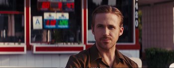 Movie still from “La La Land” (2016), directed by Damien Chazelle – A person wearing a brown shirt; Close Up shot, Over the shoulder angle